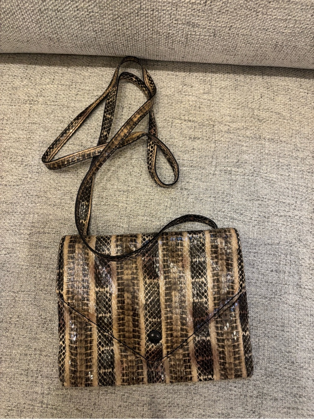 BCBGeneration Snake-Embossed Mini Crossbody in Brown and Black